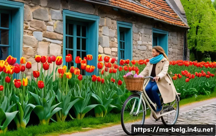 벨기에 사계절 날씨 - **"A picturesque spring scene in Belgium. A charming European village is bathed in soft, early morni...